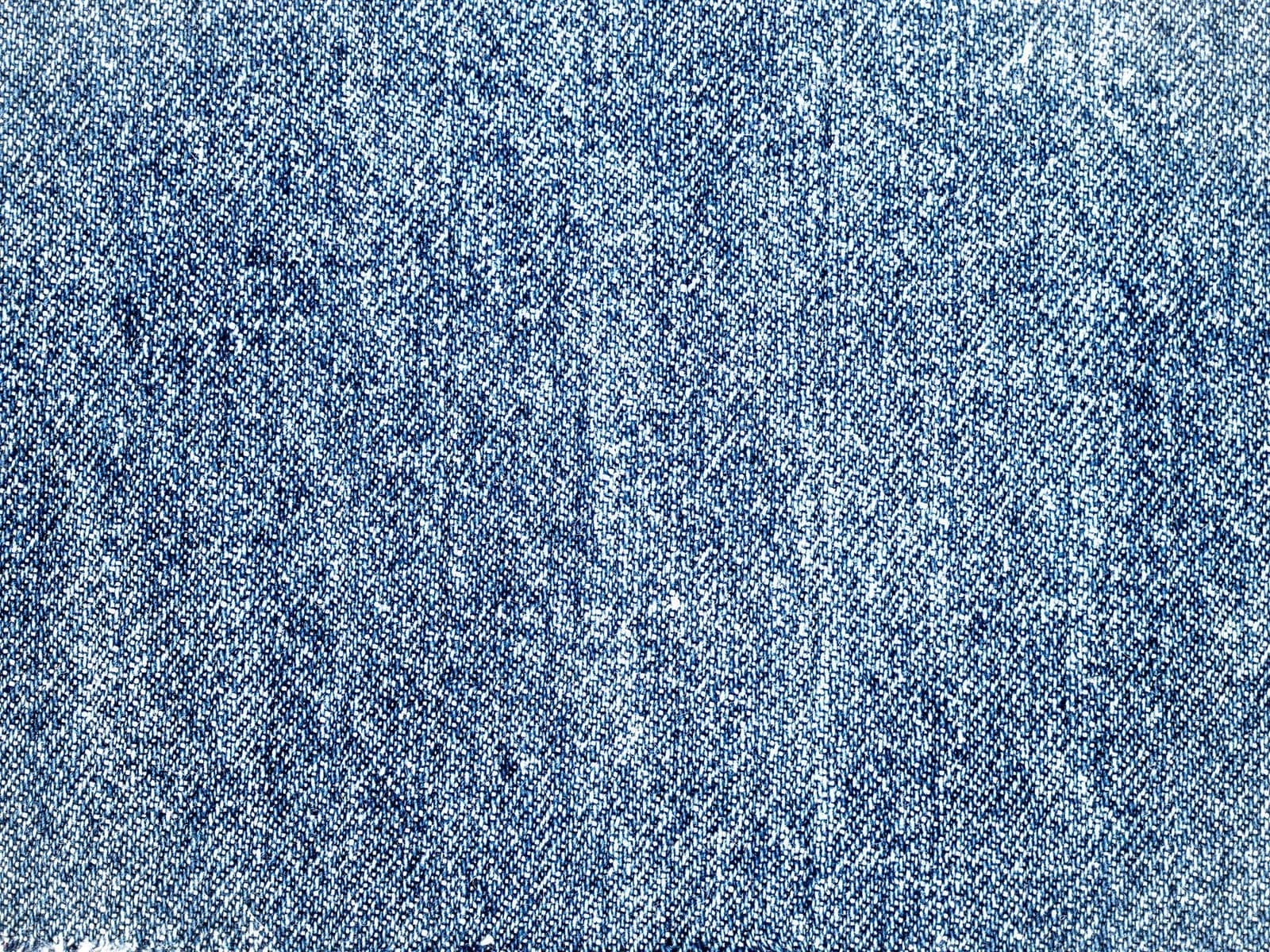 Açık mavi denim kumaşın çapraz dimi dokusu, yakın plan